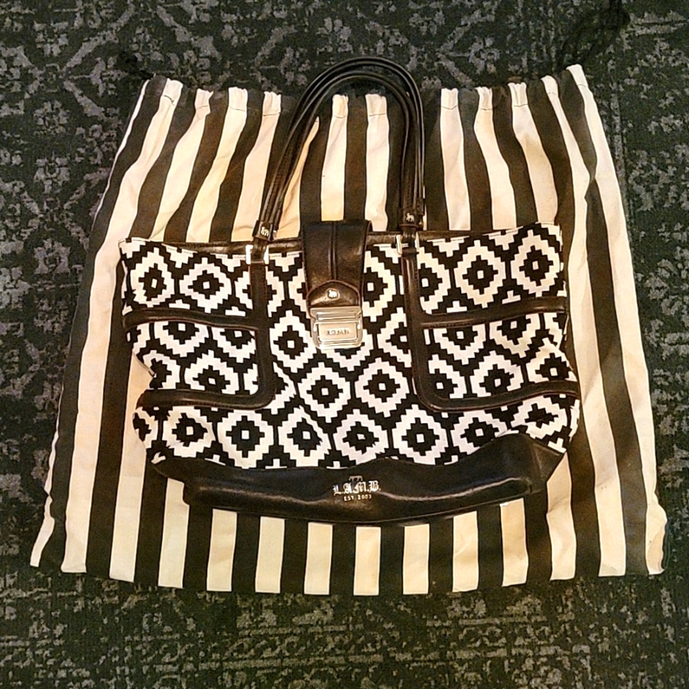 L.A.M.B. by Gwen Stefani large tote handbag black and white geometric design